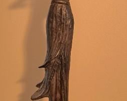 Bronze statue of woman playing violin
