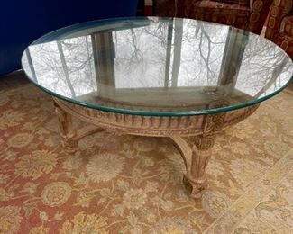 Glass-topped coffee table