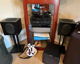 Electronics including Allison CD-6 bookshelf speakers (on stands), Velodyne MiniVee 8" subwoofer, Nintendo Wii console bundle, Sony STR-AV710 receiver, Sharp Aquos PC card input receiver