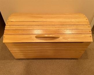 Oak toy chest on wheels