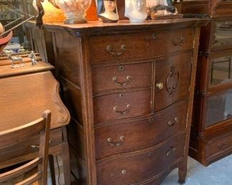 Antique curved front dresser with hat compartment