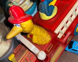 Big bird driving the fire truck