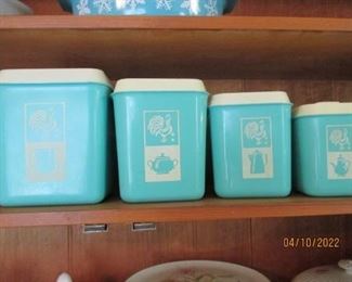 Plastic Canister Set.  Small canister has a crack. 