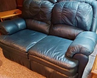 Leather reclining loveseat (some damage on leather)