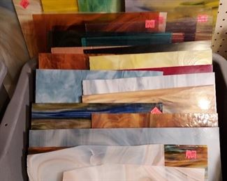 Large number of stained glass pieces