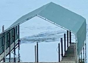 2018 Forest Green Dock Cover. Measuring approximately 30 feet long by 12 feet wide. The roof, side poles and white bumpers are included.  This item is in very good/used condition. It is not set up. It was stored over the winter. This quality item retails for about $8,000. 
