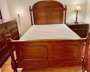 This stunning queen bed has a headboard that measures 71 inches tall. Sleep in comfort and style in this gorgeous bed!
