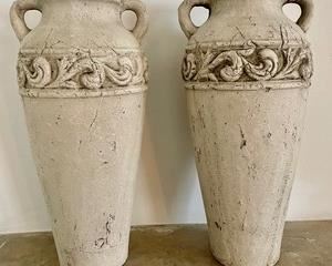 These cement vases with handles each measure 14 inches tall. Great for indoor or outdoor use!