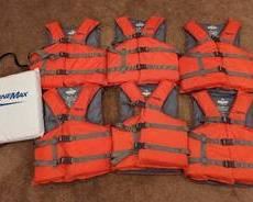 Marine Max Life Jackets. Includes six jackets and a floating seat pad. All are a size universal adult.