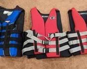 Assorted Life Jackets. Includes adult sizes small, medium and large/x-large.