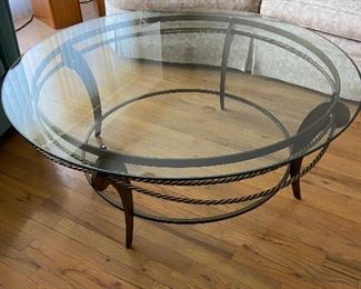 Coffee table in Glass and Metal Sofa in background also for sale
