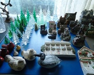 a collection of art glass Christmas trees