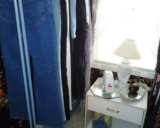 a nice metal clothing rack on wheels