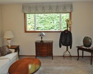 White/ivory sofa (93.5” long, 27” high, 34” deep), end table, marble top walnut server w/4 drawers (32” tall, 32” wide, 16” deep), vintage brass clothes stand, vintage Air Force bomber jacket, Tony Evans #332 18” Raku Lava Luster vase, Queen Anne Georgian style tea tables w/pull out trays (28”x18”), two available, drop leaf coffee table (52”x18”, 52”x36” w/leaves up).