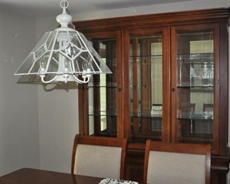 Bassett china cabinet (84” tall, 65.5” wide, 18” deep),
Bassett dining set w/6 chairs (44”x68”, 2 18” leaves).

