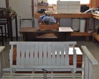 Wooden glider (49” wide, 26” deep).