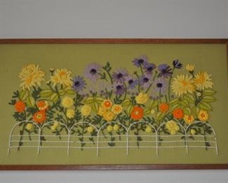 Vintage framed needlework flowers.
