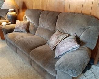 Reclining sofa, exceptional condition, brown in color, lamp unavailable 