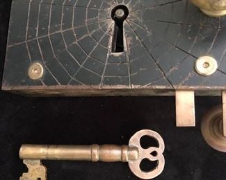 A real mystery lock from the 1800's we have dubbed it the "Spyder Lock". Obtained in New York many years ago and shown in a National Lock Show in Indiana in the early 1990's, The Dixons were offered $6,800 for it but said it was not for sale they just wanted to see if anyone knew more about it. The mechanism works beautifully and it comes with the original key.  A one of a kind for any collector of Locks or the unusual. As a point of interest this Spyder Lock was rented by a Movie Production Company in the 1990’s for Nicole Kidman’s movie entitled “Stoker”
$4,400 or best offer.  Call 615-364-3726 to purchase or make offers and more information.                                             