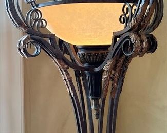 Beautiful Ornate Floor Lamp with a lovely elaborate design.  Light up any room in your home with this ornate and lovely floor lamp.

Measures about 78" tall with the base measuring 17" 