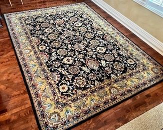 Beautiful Area Rug by Southern Living - measuring 9' x 12'. A lovely style and pattern sure to bring style to any home. In good condition with light wear/use.