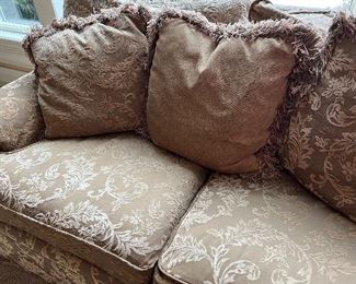 Gorgeous Upholstered Loveseat by Huntington House.  Luxurious upholstery in a two tone gold fabric with coordinating accent pillows. In overall good condition, with light wear. 

Measures about 70" long x 41" deep. 