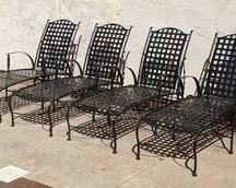 Set of Four Metal Patio Lounge Chairs. There are a few light rust spots, but all look to be in otherwise great condition. Each measures 26” wide, 50” deep and the back height is adjustable