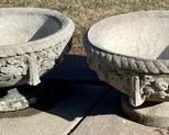 Pair of Cement Planters measuring 14 inches tall and 24 inches in diameter