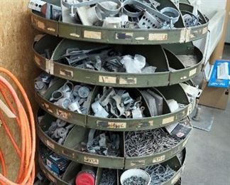 Vintage Metal Hardware Turnstile Including Assorted Nails, Hinges, Chain-link Fence Parts, Bolts And More, 65" x 36" Diameter