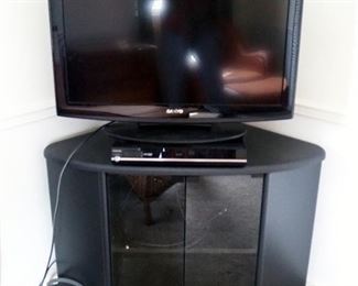 Sanyo 32" Model DP32640 LCD TV, Toshiba HDDVD Player Model HD-A20, And Corner Media Cabinet With Glass Doors 26" x 39" x 24"
