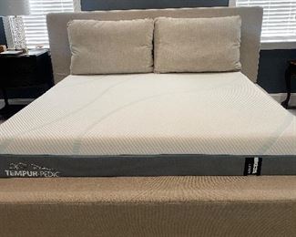 King Size Ashley Furniture bed 
Tempur-Pedic Mattress. Mattress is 6 months old 