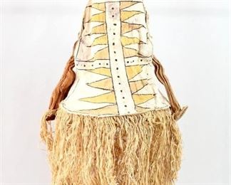 Lot 43: Brazil Folk Art Bark Cloth Mask Outfit Bruja Costume. Stunning costume is made of bark cloth and natural fibers, which have been sewn, dyed & painted. Display on a wall as ethnographic sculpture. Likely 20th century; acquired in Brazil 1976. From the collection of Barbara Porter & Robert Wincuinas.
Dimensions are 55 in h x 30 in w. Condition is good with some wear and discoloration on the back of the head. Please call or email for a detailed condition report.