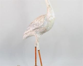 Lot 45: Large molded papier mache and wood stork. Possible early advertising piece. Repainted at some point in its history and now flaking. Wonderful character & patina in this bird sculpture. Acquired at Brimfield, early 1980’s.
Dimensions are 63 in h x 16 in w x 34 in d. Condition is good with flaking paint. Please call or email for a detailed condition report.