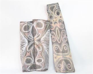 Lot 57: 2 New Guinea Painted Ceremonial House Panels,Shields. Two painted, tribal ceremonial house panels made of bark from New Guinea. One of the panels are made up of two separate pieces and joined together. From the collection of Barbara Porter & Robert Wincuinas.

Dimensions of the wider panel are 47 in h x 26 in w. Dimensions for the taller panel are 62 in h x 16 in w. Condition is good. Surface wear throughout. Cracks and some paint chipping. Fragile. Please call or email for a detailed condition report.