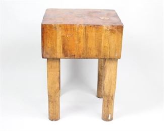 Lot 60: Small Industrial Butcher Block Cutting Table,Shop. A low butcher's block table, possibly in maple. In good condition with great patina and color to the wood. Could be reused as a chopping block, or as a stool or side table.

Dimensions are 27.75 in h x 20 in w x 20.25 in d. Condition is good. Some surface wear throughout and discoloration to wood. Please call or email for a detailed condition report.