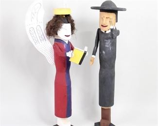 Lot 81: Pair of Folk Art Carved Wood Sculptures, Angel & Priest. Large carved standing figures have vibrant polychrome decoration. The priest bears resemblance to Saturday Night Live's Father Guido Sarducci while the angel has a full head of hair; both stand on square black bases. Created in New England in the 1980’s by outsider artist Robert Wincuinas.

Dimensions are 45 in h x 18 in w x 19 in d for the angel and 3 in h x 8 in w x 13 in d. Condition is good. Please call or email for a detailed condition report.