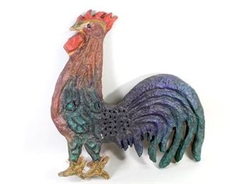 Lot 90: Folk Art Papier Mache Rooster. Colorfully painted handmade rooster has a flat back covered with burlap. Delightful decorative item for your farmhouse kitchen or perhaps a restaurant.
Dimensions are 23.5 in h x 23 in w x 1.75 in d. Condition is good to fair with loose backing, surface wear and discoloration. Could use a cleaning. Please call or email for a detailed condition report.