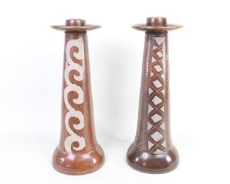 Lot 95: Pair of Mexican Folk Art Ceramic Pottery Candleholders. Beautiful and tall round burnished ceramic candleholders have inscribed decorations. Acquired in Mexico in the early 1980’s. From the collection of Barbara Porter & Robert Wincuinas.

Dimensions are 18 in h x 7 in w x 7 in d. Condition is good. Please call or email for a detailed condition report. 