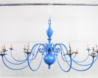 Lot 101: Oversized Blue Painted Brass Electric 12-Arm Chandelier. An oversize chandelier with twelve lights in blue painted brass. At five feet wide this is an impressive chandelier that would make a bold statement in a large dining room, restaurant or retail space.

Dimensions are 33 in h x 61 in w x 61 in d. Condition is good. Minor surface wear with paint loss and scuffs throughout. Wear to lights. Minor rust. Crack on the side. The lamp has not been tested for function, may need to be rewired. Please call or email for a detailed condition report.