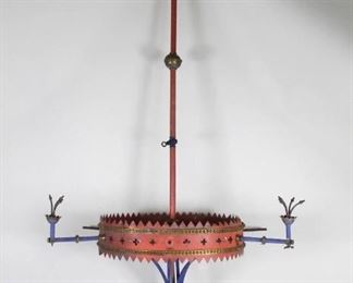 Lot 103: Ex Large Patriotic Painted Ceiling Gas Chandelier Light. A large gas light chandelier, made in red and blue painted metal, possibly from a church. It has four blue painted arms and a red crown with a floral pattern and two brass bands. A restoration project for the enthusiast or to be enjoyed simply for its decorative qualities.
Dimensions are 93 in h x 51 in w x 51 in d. Condition is as is. Two arms and burners are missing. Overall surface wear, scratches and dents. The lamp has no been tested for function. Please call or email for a detailed condition report.