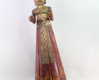 Lot 114: Gauri,Ganguar Rajastan India Carved Woman Sculpture. Carved wooden sculpture of a woman, probably Gauri (Parvati), associated with the Hindu Ganguar festival of Rajasthan, in northern India. Standing on a platform, painted wearing beautiful and detailed clothing. Acquired in the 1980s, India. From the collection of Barbara Porter & Robert Wincuinas.

Dimensions are 39 in h x 15 in w x 14 in d. Condition is fair to good. Surface wear, weathered with paint chipping. Feet needs repair. Please call or email for a detailed condition report.