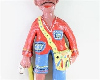Lot 136: Michel Sinvil Haitian 1980s Papier Mache Sculpture. Sculpture made of papier maché and painted in bright colors with great details. Signed on the back "Art Michel." From the collection of Barbara Porter & Robert Wincuinas.

Dimensions are 45.5 in h x 24 in w x 5 in d. Condition is good. Surface wear and paint chipping in some spots. Please call or email for a detailed condition report