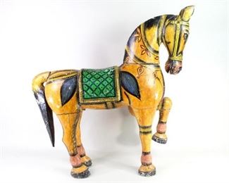 Lot 139: India Folk Art Painted & Carved Wood Horse Sculpture. Large carved wood standing horse model is very colorfully painted by a skilled hand in bright yellow, green black and red. Eye catching folk art to display as sculpture. Acquired in the mid 1980’s in India. From the collection of Barbara Porter & Robert Wincuinas.
Dimensions are 28 in h x 31 in w x 7 in d. Condition is good with some chipping to edges and paint. Please call or email for a detailed condition report.