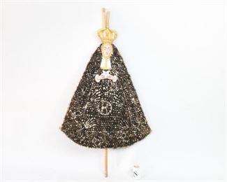 Lot 161: Mexican Folk Art 1940s Processional Madonna Festival Figure. Beautiful Crowned Madonna is on a bamboo frame covered with dried flowers and hand painted face, crown and hands. Acquired in Oaxaca Mexico in 1984. There are 3 processional figures in this auction, listed separately. Exquisite folk art to hang as sculpture. From the collection of Barbara Porter & Robert Wincuinas.

Dimensions are 63 in h x 34 in w. Condition is good. Please call or email for a detailed condition report.