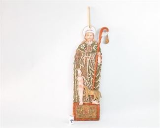 Lot 162: Mexican Folk Art 1940s Processional Madonna Figure 3/3. Beautiful Saint Roch, the patron saint of dogs, is on a bamboo frame covered with dried flowers and hand painted face, crown and hands. Acquired in Oaxaca Mexico in 1984. There are 3 processional figures in this auction, listed separately. Exquisite figures to display as sculpture. From the collection of Barbara Porter & Robert Wincuinas.

Dimensions are 68 in h x 21 in w. Condition is good. Please call or email for a detailed condition report.