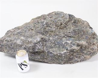 Lot 164: Giant Chunk of Natural Raw Labradorite. What a spectacular specimen, with large areas of bright iridescent blues & greens. Display on a pedestal as natural sculpture. There is another specimen in this auction listed separately.
Dimensions are 7.5 in h x 15.5 in w x 26 in d. Condition is good. Please call or email for a detailed condition report.