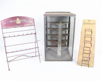 Lot 176: 3 Store Display Racks & 2 Signs,Pie Rack,Schraffts,Kingston Candy. Lot of 3 includes a glass and metal display case for pies with 6 triangular shelves, a red metal rack with a sign at the top that reads "Queen Anne/5 cents/Kingston Candy Co Distributors", and a metal rack that reads "5 cents/Schrafft's". Nice counter display pieces for a retail shop. In addition there are 2 signs, Kool Cigarettes and 7Up.
Dimensions are 20.25 in h x 12 in w x 12 in d for the pie case, and 21.5 in h x 13 in w x 6.75 in d for the Queen Anne candy rack. Kool sign is 23.5 in h x 14.5 in w and 7 Up sign is 11 in h x 26 in w. Condition is fair with surface rust, wear to paint and bent metal. Please call or email for a detailed condition report.


