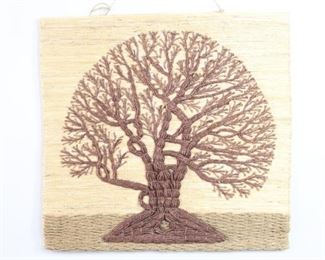 Lot 185: India Tree of Life Embroidered Jute Wall Hanging Art. Wonderful wall hanging with a Tree of Life in a dark brown colored jute embroidered on a light colored background. The back is supported with a wood stretcher at the top. Label on back is marked "Made in India."

Dimensions are 33 in h x 36 in w x 1 in d. Condition is very good. Minor surface wear. Please call or email for a detailed condition report.