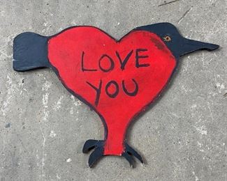 Lot 243: Earl Swanigan Outsider Art Red Love You Bird Painting. Sweet painting by Hudson's most famous outsider artist, Earl Swanigan is painted on board which has been cut out in the shape of a heart and bird, and signed in the bottom right corner. "Love You" is written in black against the red background of the bird/heart. Painting is unsigned.

Dimensions are 10.5 in h x 15 in w. Condition is good with general surface wear. Please call or email for a detailed condition report.