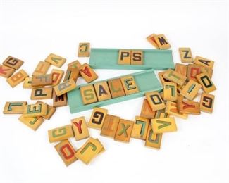 Lot 252: Lot of colorful painted wooden block letters with bases. These letters may have originally been used to help children learn how to spell. Now they could be used to make an adorable sign for a business. They would also look nice on a shelf, occasionally rearranged with fun new words.

The dimensions of the letters are 3in x 1.75in x .5in. The dimensions of the bases are 3.5in x 12in x .5in. They are in very good condition with minor surface wear. Please call or email for a detailed condition report.